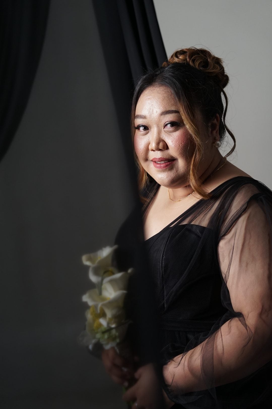 Siti Wahyuni tersenyum